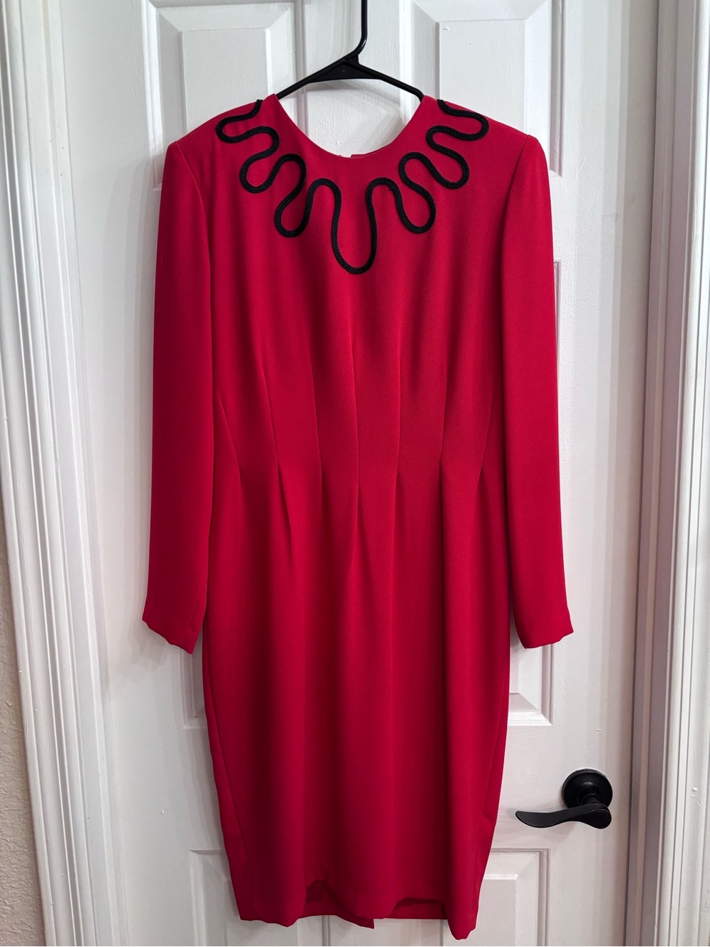 Elegant Red Long-Sleeve Dress with Black Neckline Accent